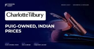 Charlotte Tilbury brand audit by FashionAudit: Charlotte Tilbury logo and the headline “Puig-Owned, Indian Prices” over a rose-gold makeup compact