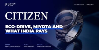 Citizen brand audit by FashionAudit: Citizen logo over a solar-powered steel watch catching sunlight on a glass table