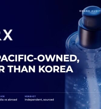 COSRX brand audit by FashionAudit: COSRX logo and the headline “Amorepacific-Owned, Cheaper Than Korea” over Korean snail mucin essence bottle with a dewy glass texture