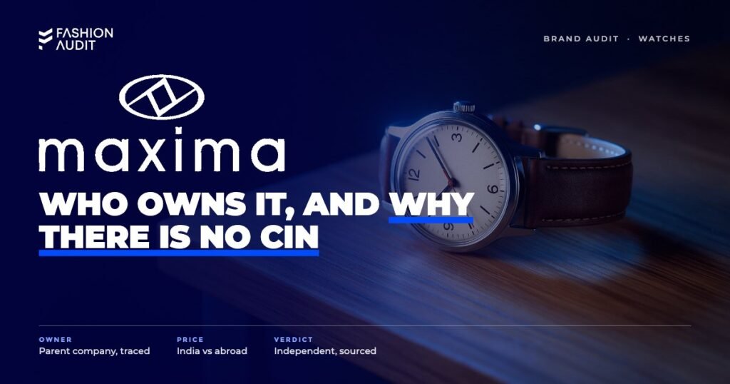 Maxima brand audit by FashionAudit: Maxima logo over an affordable classic analog wristwatch with a leather strap on a wooden desk