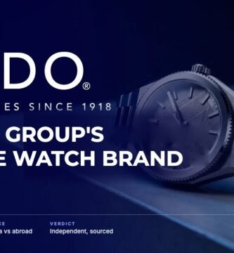 Mido brand audit by FashionAudit: Mido logo and the headline “Swatch Group's Le Locle Watch Brand” over a sporty steel automatic watch with a textured architecture-inspired dial
