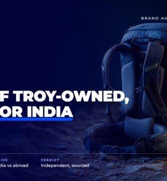 Osprey brand audit by FashionAudit: Osprey logo over a technical hiking backpack with hip belt on a rocky mountain trail