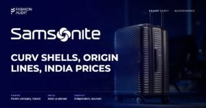 Samsonite brand audit by FashionAudit: Samsonite logo and the headline “Curv Shells, Origin Lines, India Prices” over a sleek graphite hard-shell spinner suitcase